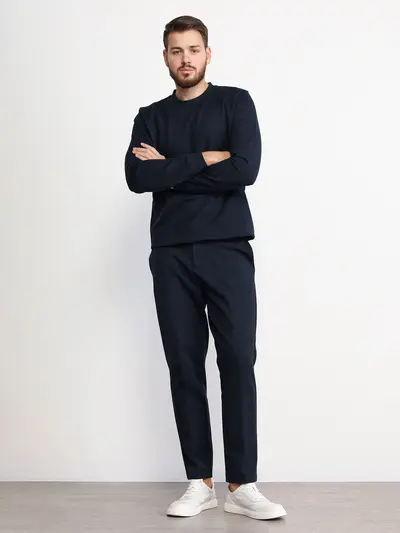 Брюки трикотажные темно-синего цвета из смесового хлопка